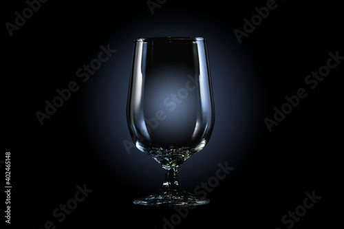 silhouette of a wine glass on black background
