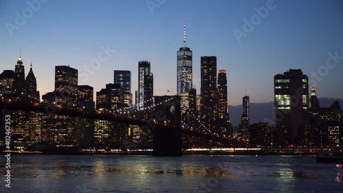 NYC Skyline at Sundown with Boat Passing