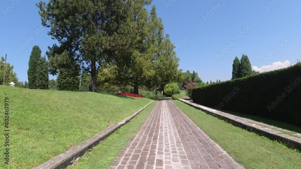 Gold kart trip in sigurta' park in italy on a sunny day with great view of the trees and plants 3 Gold kart trip in sigurta' park in italy on a sunny day with great view of the trees and plants 3