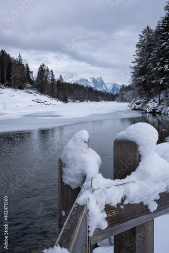 Snowy winter landscape at swiss lake Chapfensee photo