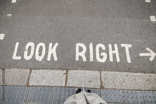 Look right sign on road in London. Great Britain