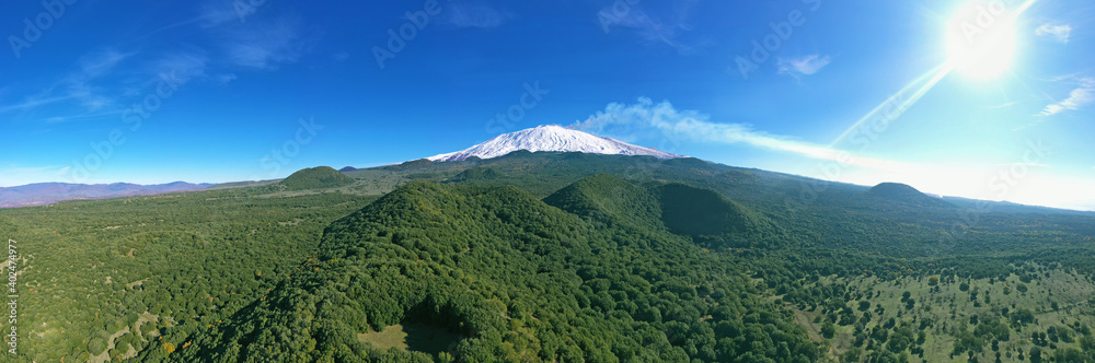 Virtual reality 180 degree panoramic view of the Etna volcano with its lava flows and its secondary craters.