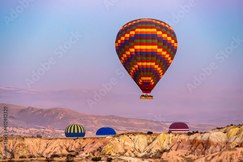 Multicolored Colorful hot air balloons in Cappadocia, bottom shooting angle © attraction art