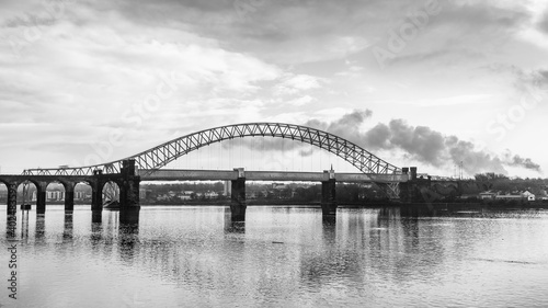 Runcorn Bridges spanning the Mersey Estuary in monochrome