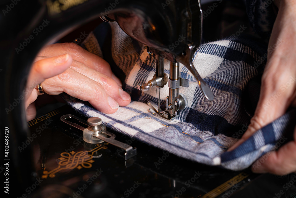 Sewing on vintage electric sewing machine