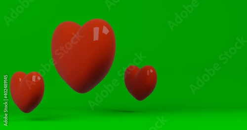 red heart on green background