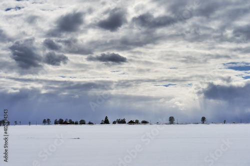 landscape with snow on the fields 