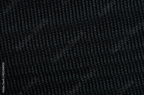 Black color of silk fabric texture background. Image photo