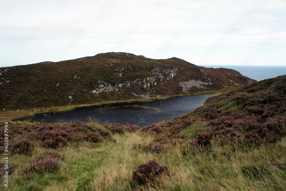 Tiny lake Slievenalogh on top of the mountain of the same name.Cooley Peninsula.Ireland.