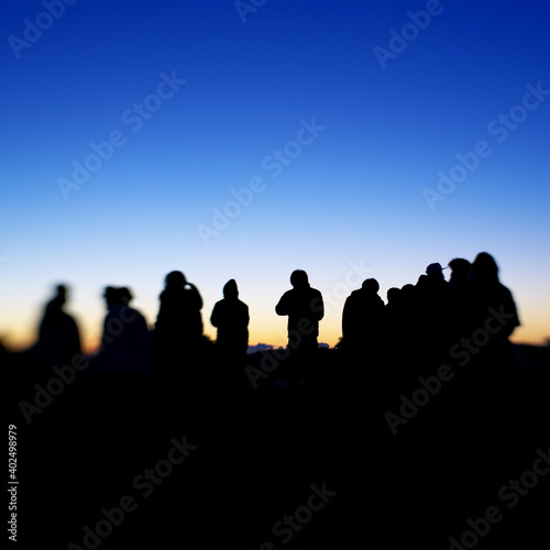 Tokyo,Japan-January 1, 2021: Silhouette of people on a hilltop 