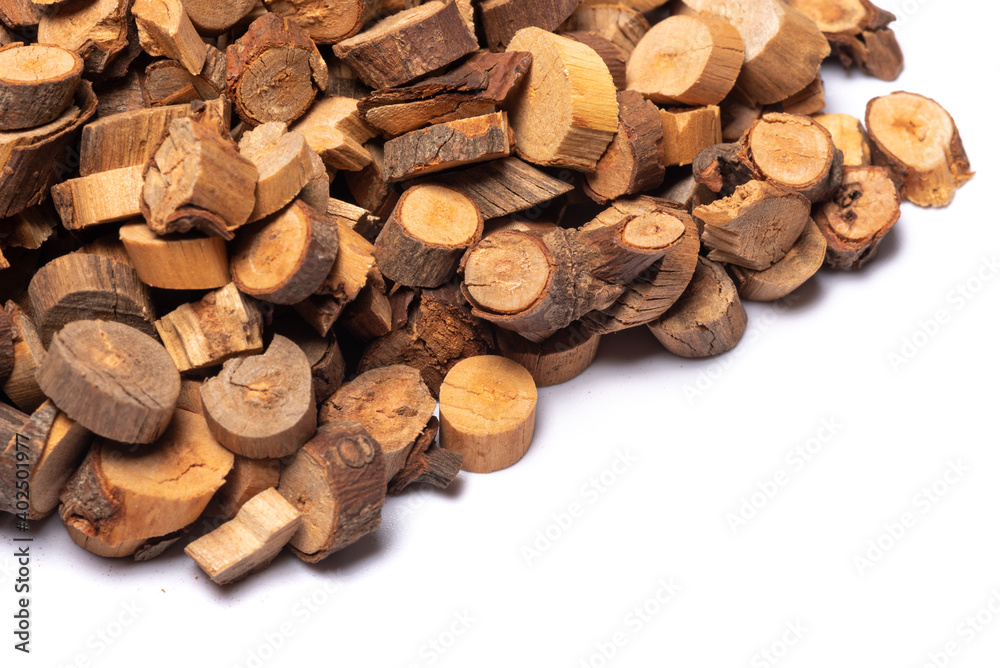 Chinese cinnamon, latin name Cinnamomum cassia heap on a white background Chinese cinnamon, latin name Cinnamomum cassia heap on a white background
