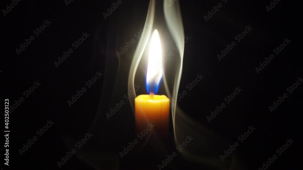 Yellow candlelight, black backdrop, celebration Yellow candlelight, black backdrop, celebration