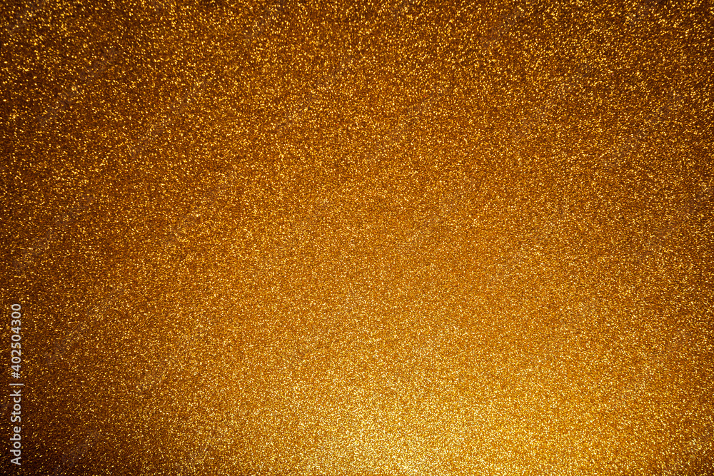 gold Sparkling Lights Festive background with texture. Abstract Christmas twinkled bright bokeh defocused and Falling stars. gold Sparkling Lights Festive background with texture. Abstract Christmas twinkled bright bokeh defocused and Falling stars.