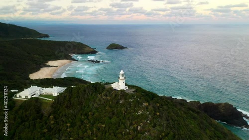 Cinematic slow rotating drone shot of Smoky Cape Lighthouse near South West Rocks, Kempsey Shire, New South Wales, Australia photo