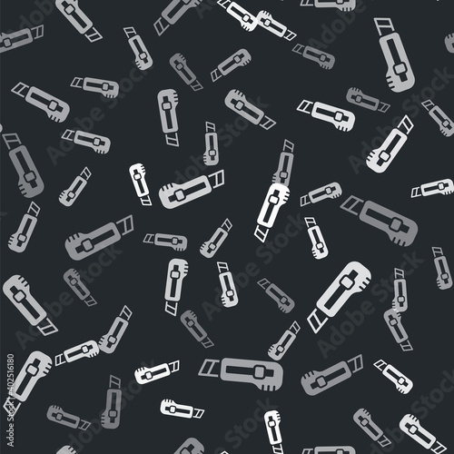 Grey Stationery knife icon isolated seamless pattern on black background. Office paper cutter. Vector.