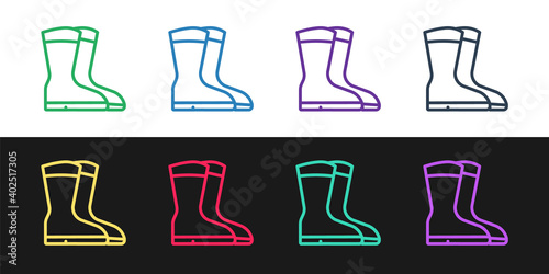 Set line Fishing boots icon isolated on black and white background. Waterproof rubber boot. Gumboots for rainy weather  fishing  hunter  gardening. Vector.