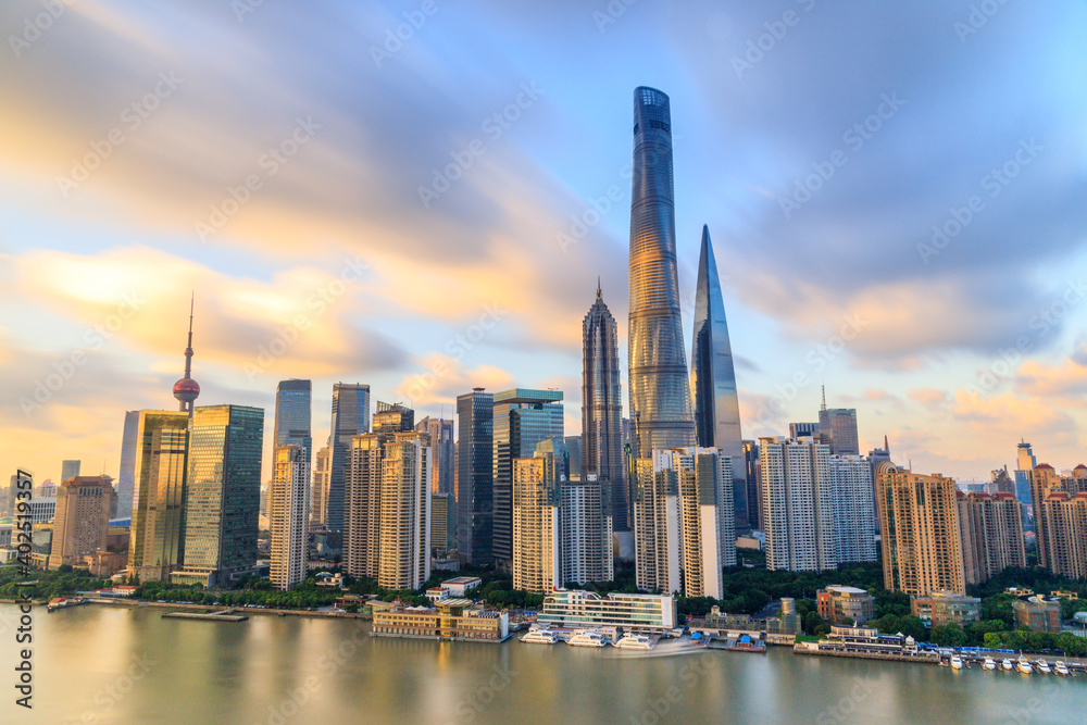 long exposure of Magnificent evening view of Lujiazui city architectural scenery along Huangpu river in Shanghai, China long exposure of Magnificent evening view of Lujiazui city architectural scenery along Huangpu river in Shanghai, China