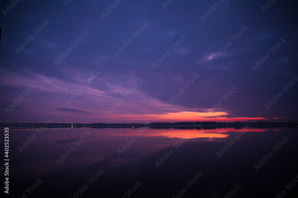 Fototapeta premium Sunset with reflection on the lake