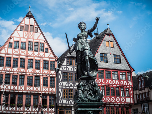 Statue on the Fountain of Justice on the Main Square in Frankfurt am Main, Germany photo