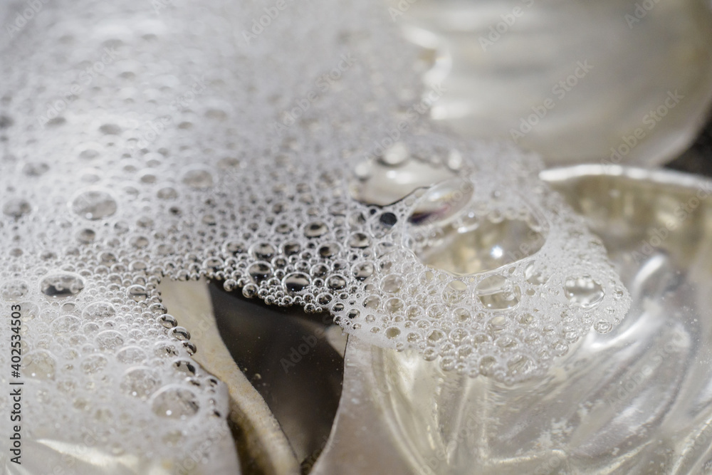 Walnut molds with water and bubbles. Walnut molds with water and bubbles.