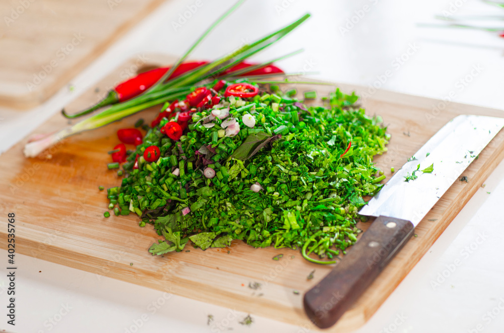 fresh herbs on a chopping board fresh herbs on a chopping board