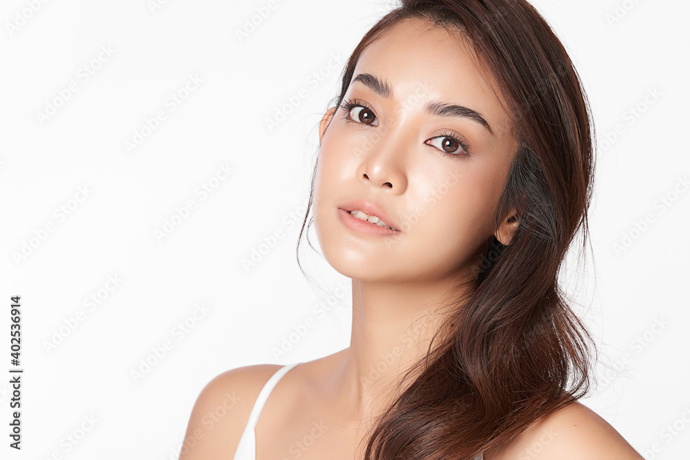 Beautiful Young asian Woman with Clean Fresh Skin, on Pink background, Face care, Facial treatment. Cosmetology, beauty and spa. Asian women portrait Beautiful Young asian Woman with Clean Fresh Skin, on Pink background, Face care, Facial treatment. Cosmetology, beauty and spa. Asian women portrait