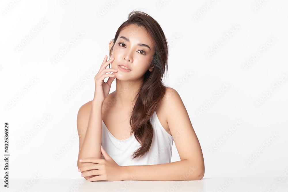 Beautiful Young asian Woman with Clean Fresh Skin, on Pink background, Face care, Facial treatment. Cosmetology, beauty and spa. Asian women portrait Beautiful Young asian Woman with Clean Fresh Skin, on Pink background, Face care, Facial treatment. Cosmetology, beauty and spa. Asian women portrait