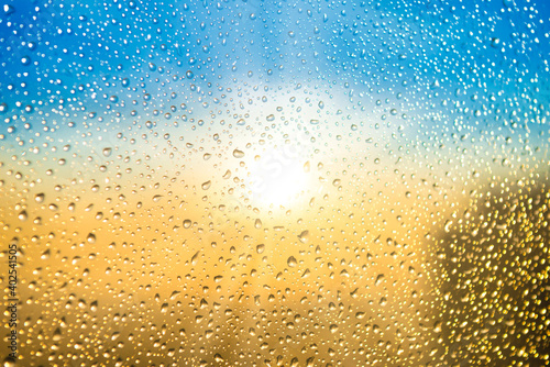 Wallpaper Mural Beautiful sunset through a spattered glass with water rain drops Torontodigital.ca