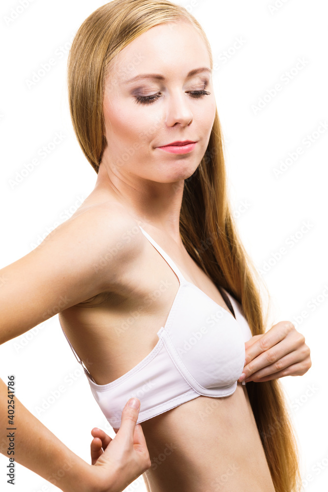 Obraz premium Woman wearing too big bra