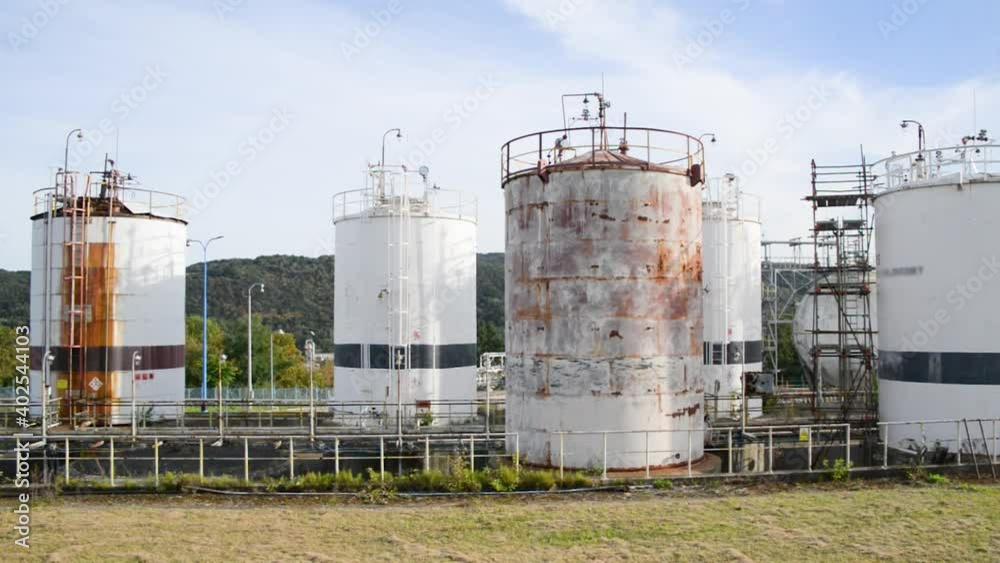 Obsolete old chemical factory storage tanks rusty Obsolete old chemical factory storage tanks rusty