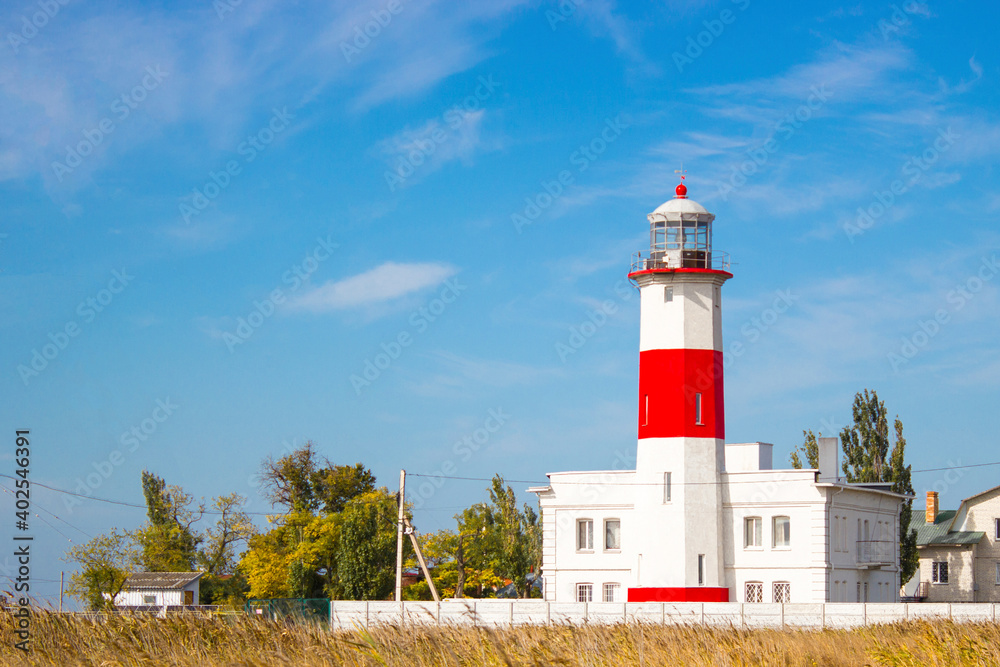 Beautiful lighthouse on the beach in Berdyansk. Beautiful lighthouse on the beach in Berdyansk.