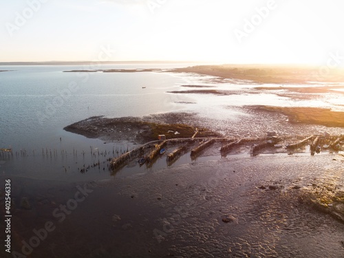 Panorama of wooden pier on stilts boat dock wharf port harbour Cais Palafitico da Carrasqueira Setubal Alentejo Portugal photo