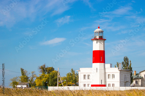 Beautiful lighthouse on the beach in Berdyansk.