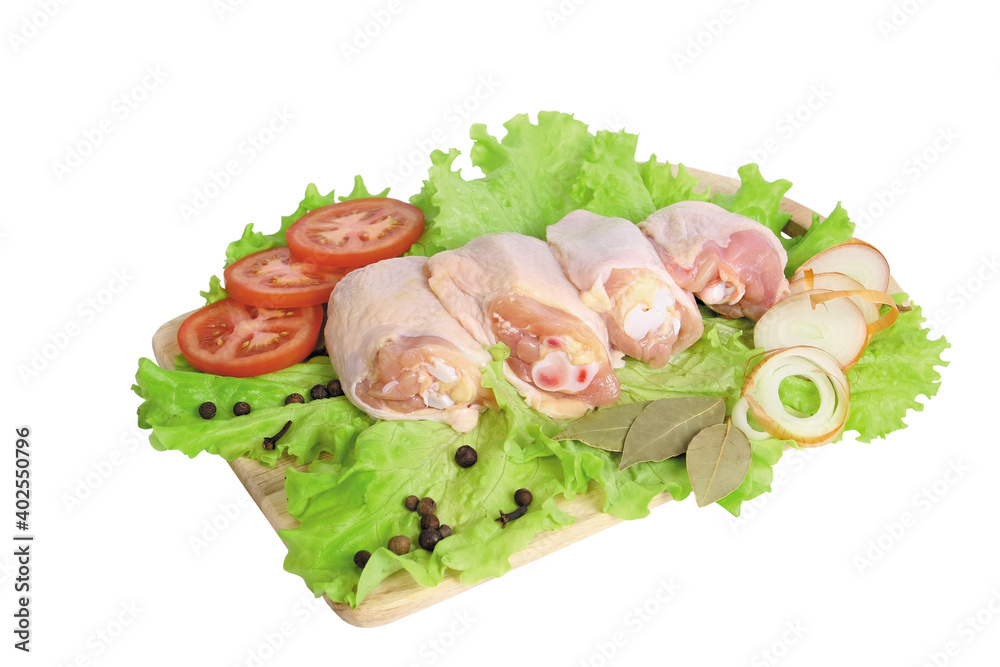 raw chicken thigh on a board