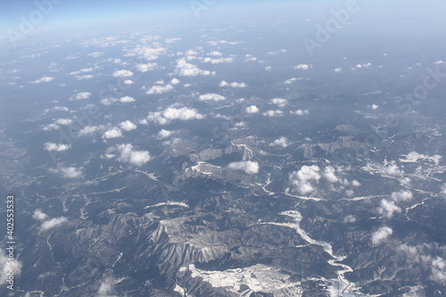 the amazing winter landscape from the windows in an airplane
