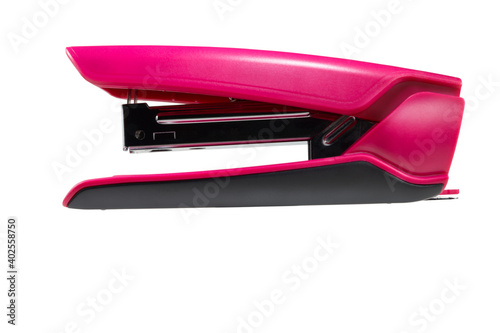 Pink stapler. Big. Isolate. Side view