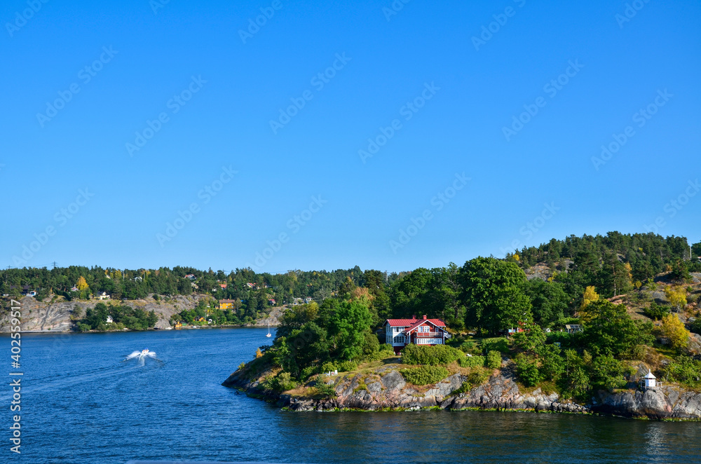 Small rocky islands in the Stockholm archipelago, on the Baltic Sea in the early morning. Swedish landscape