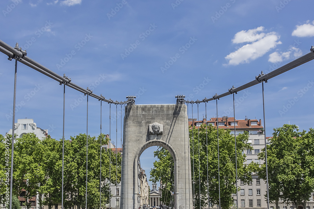Obraz premium Old Gateway College bridge (Passerelle du College, 1845) - bridge over Rhone river at the city Lyon, Rhone-Alpes, France.