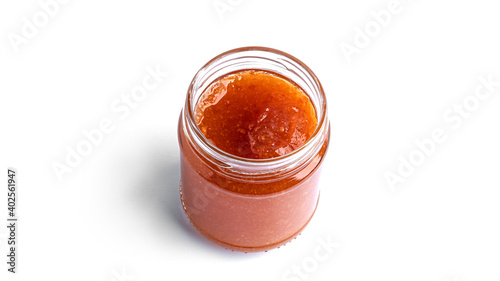 Orange jam in a glass isolated on a white background. High quality photo