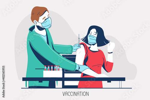 Doctor wearing face medical mask doing injection of COVID-19 virus vaccine to business woman patient