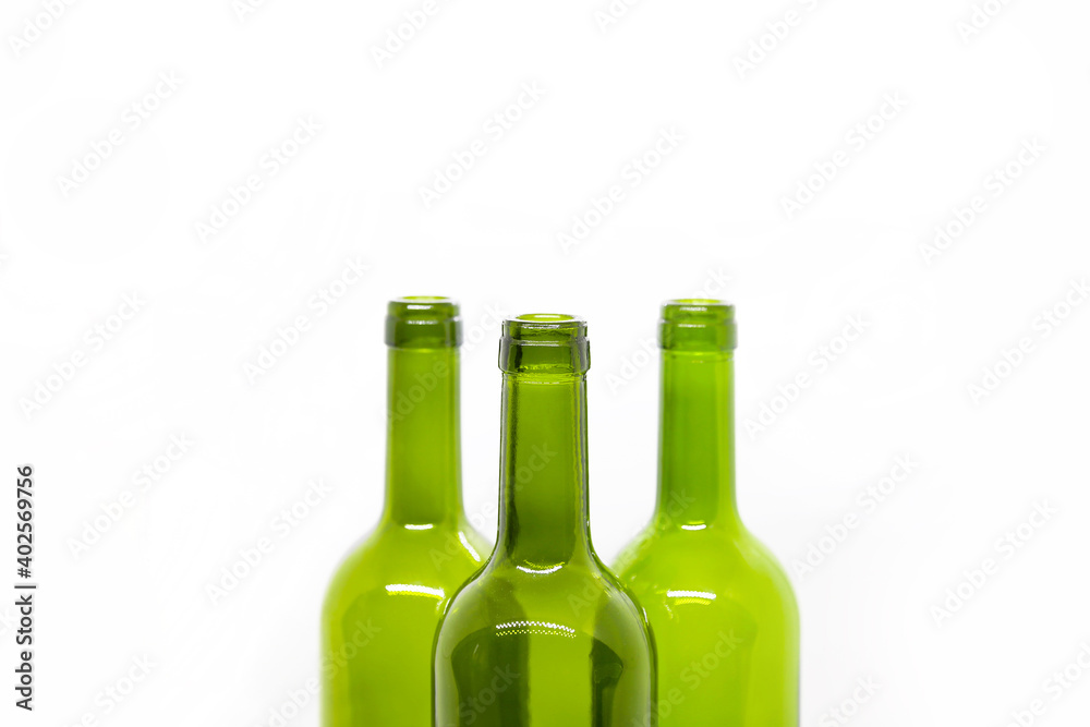 Three green empty wine bottles on a white background Three green empty wine bottles on a white background