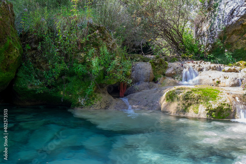 waterfall in the forest  Urederra river. Navarra  Spain 