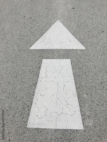 arrow on asphalt
