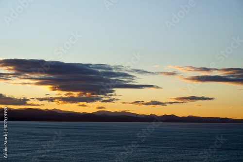 The view from Cape Byron out towards the Hinterlands as the sun sets - Byron Bay