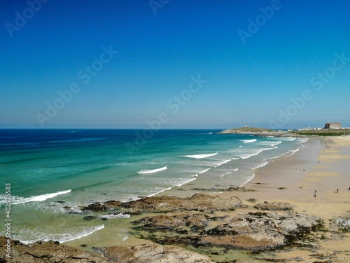 Looking across the famous Fistral Beach on a sunny day photo