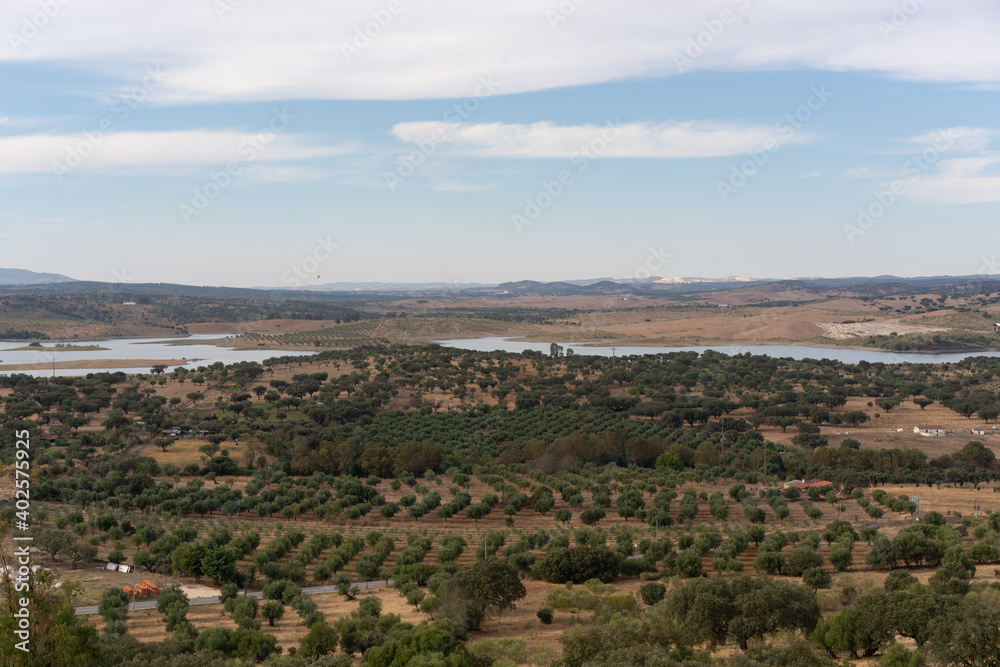 Lake water reservoir of Lucefecit Dam landscape from Terena castle in Alentejo, Portugal