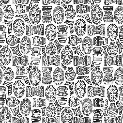 Tribal African seamless pattern with ethnic masks, jugs and drums. Colored page background. Black and white