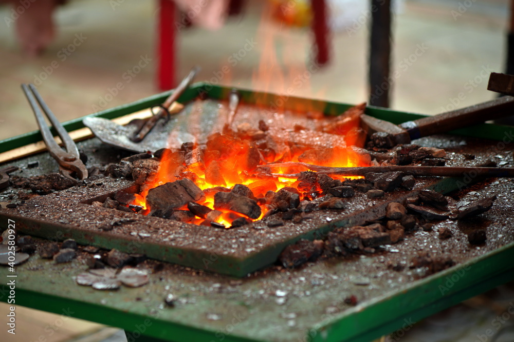 blacksmith forge with red hot coals blacksmith forge with red hot coals
