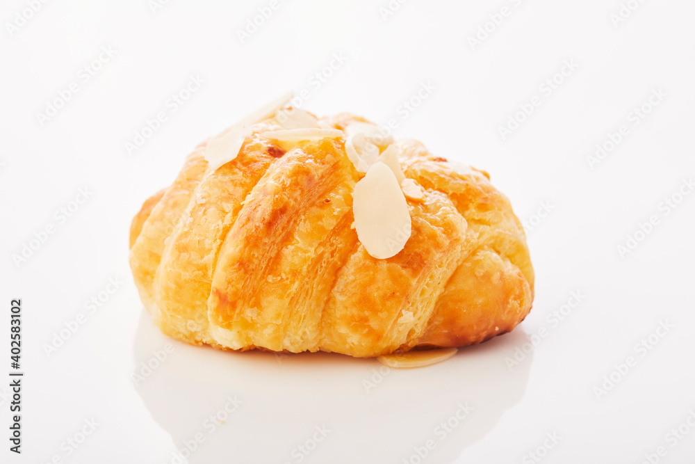 Croissant on white. Croissant on white.