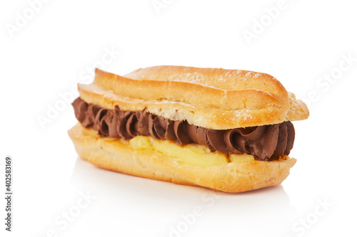 Tasty Chocolate éclair isolated on a white background photo